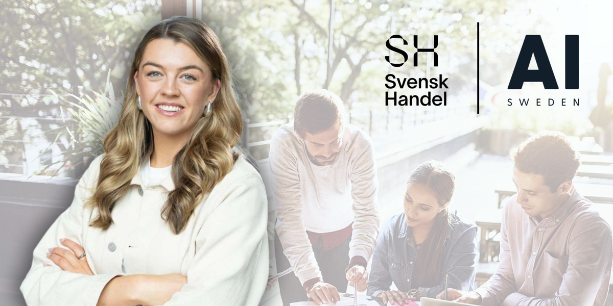 En kvinna som står framför en grupp människor.