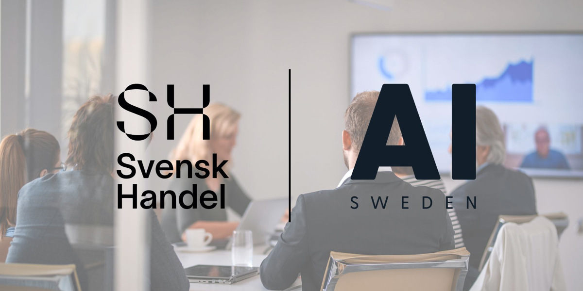 En grupp människor som sitter runt ett bord.