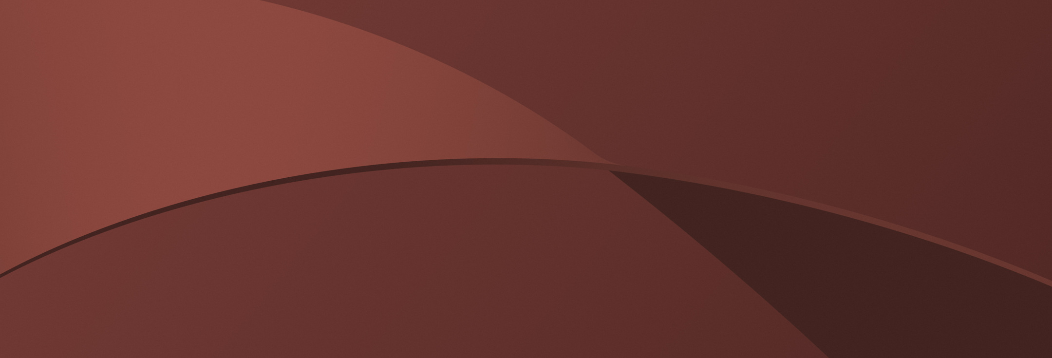 En brun bakgrund med en böjd design.