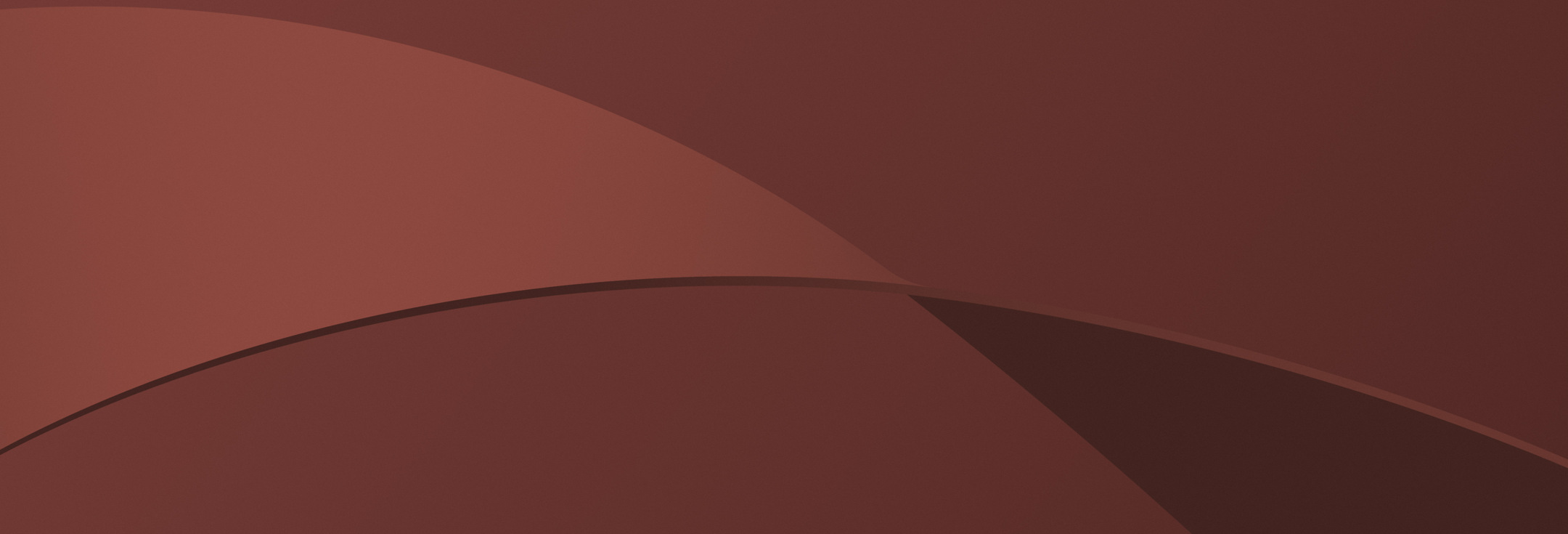 En brun bakgrund med en böjd design.