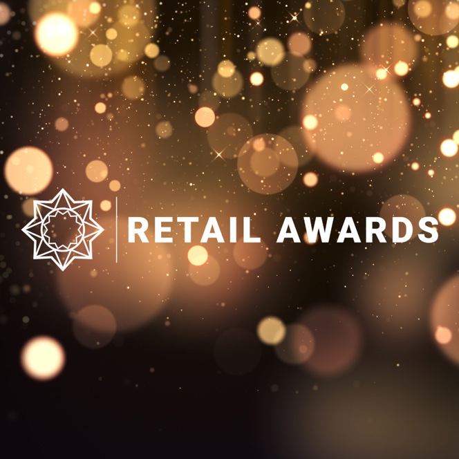 En suddig bild av logotypen för Retail Awards.