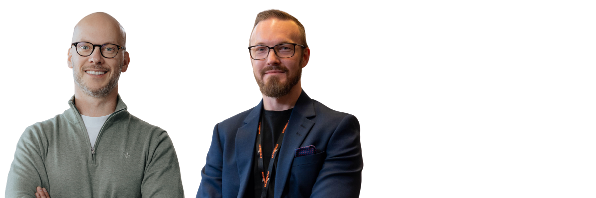 Några män som står bredvid varandra.