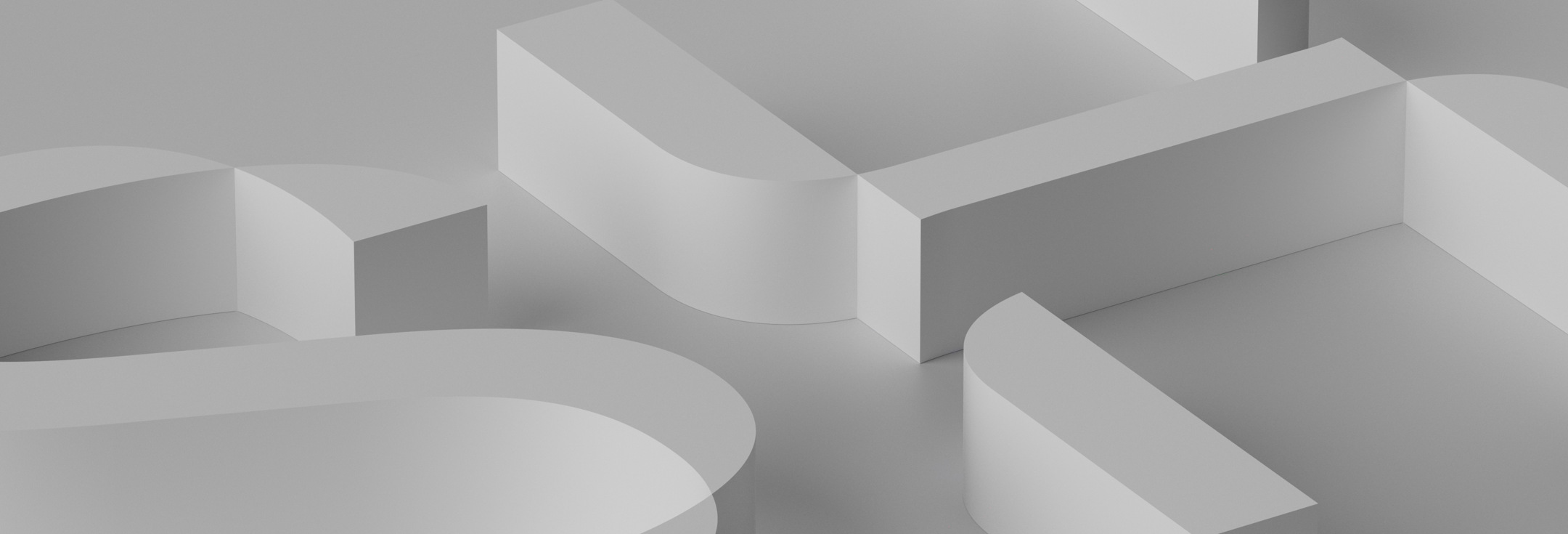 Ett antal vita former på en grå bakgrund.