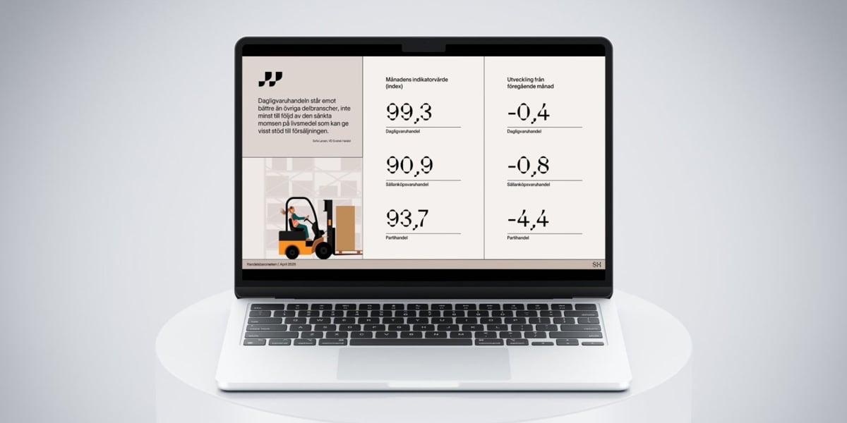 En bärbar dator som sitter på ett vitt bord.