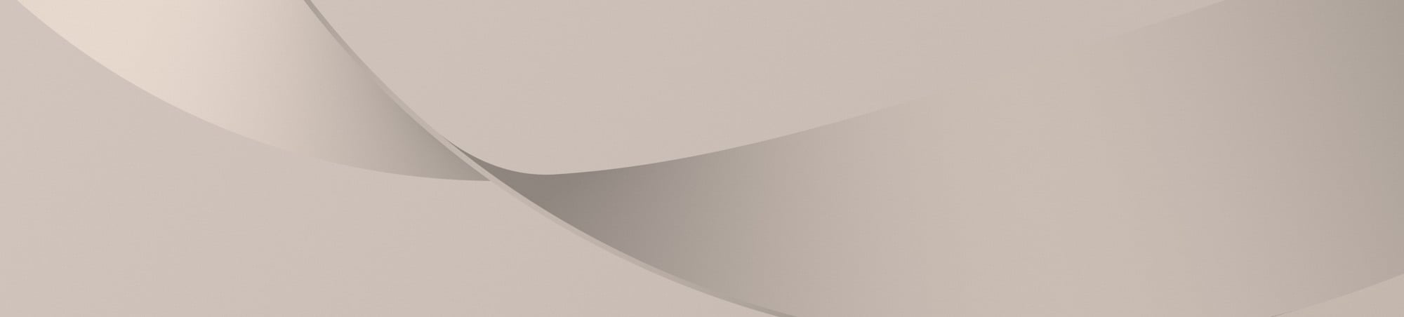 En grå bakgrund med ett böjt hörn.